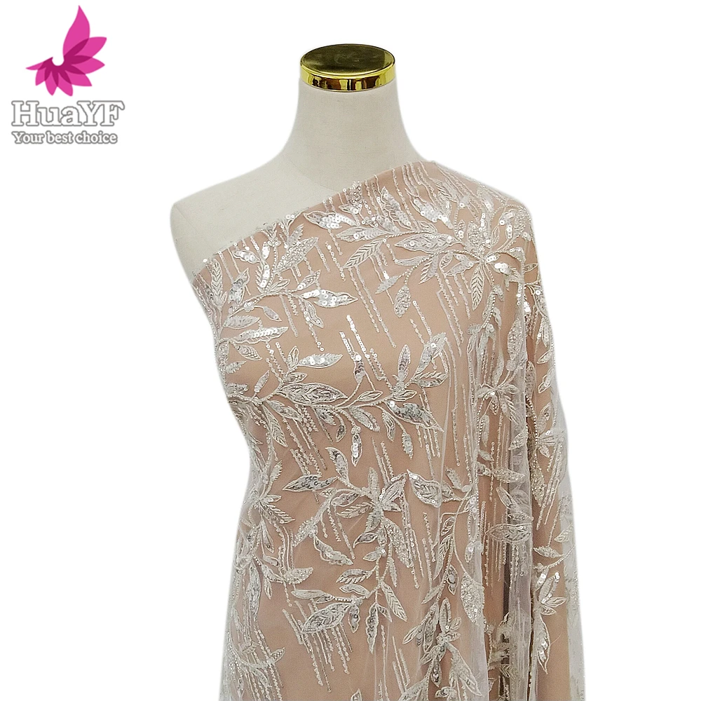 1 Yard Luxury white bridal beads lace mesh fabrics with shiny sequins for European style collection HY1894
1 Yard Luxury white bridal beads lace mesh fabrics with shiny sequins for European style collection HY1894