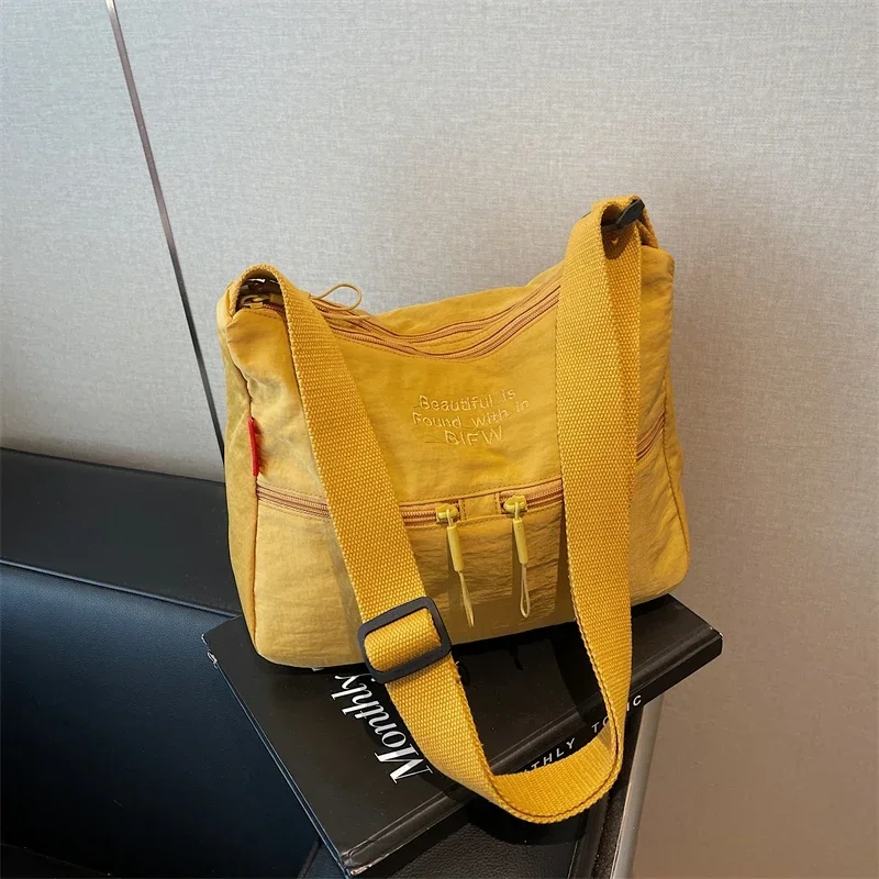 Сумка через плечо для путешествий на открытом воздухе. Новый женский легкий нейлоновый холщовый рюкзак большой вместимости, сумка для подмышек, большая сумка без сумки.
Сумка через плечо для путешествий на открытом воздухе. Новый женский легкий нейлоновый холщовый рюкзак большой вместимости, сумка для подмышек, большая сумка без сумки.