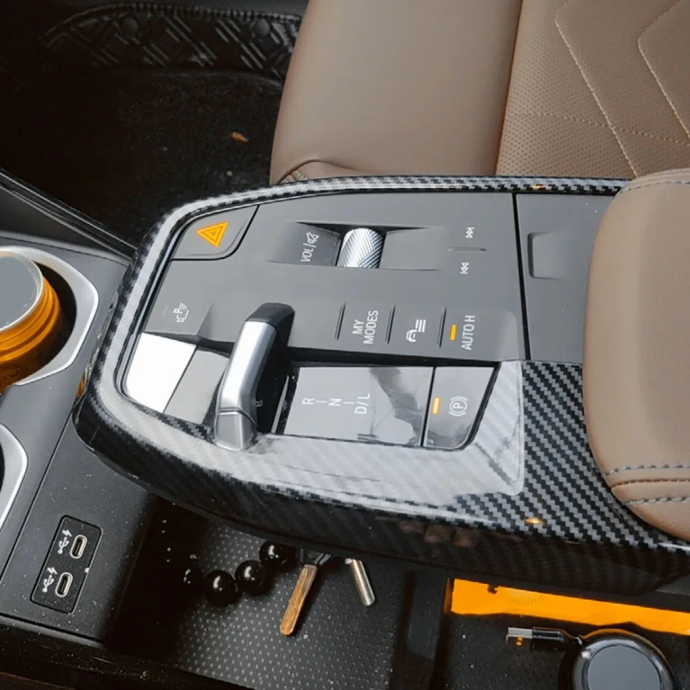 Декоративная накладка на панель переключения передач из углеродного волокна для BMW, как на фото, из АБС-пластика, с бесшовной интеграцией.
Декоративная накладка на панель переключения передач из углеродного волокна для BMW, как на фото, из АБС-пластика, с бесшовной интеграцией.