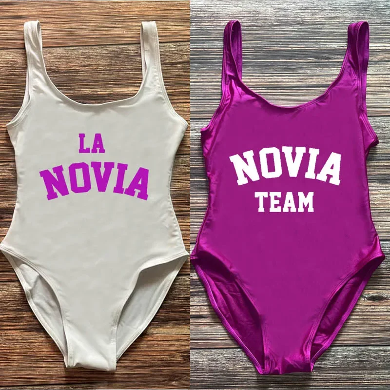 S-3XL цельный купальный костюм La Novia, женский купальник испанской команды Novia, свадебная пляжная одежда, костюм для девичника и бакалавра для девочек
S-3XL цельный купальный костюм La Novia, женский купальник испанской команды Novia, свадебная пляжная одежда, костюм для девичника и бакалавра для девочек