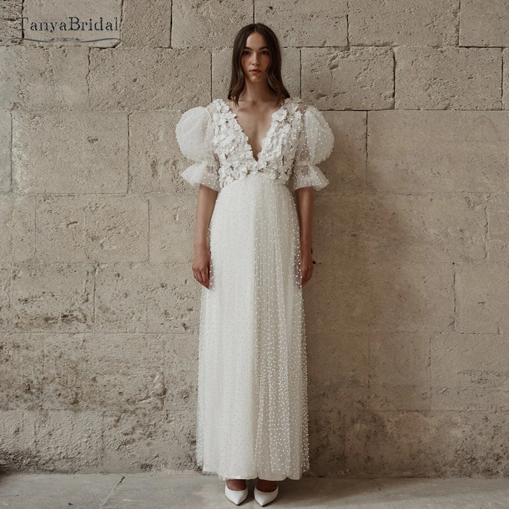 Whimsical Pearl Adorned Soft Pleated Tulle Wedding Dress Puff Sleeves 3D Floral Appliqué Bridal Gowns DW687
Whimsical Pearl Adorned Soft Pleated Tulle Wedding Dress Puff Sleeves 3D Floral Appliqué Bridal Gowns DW687