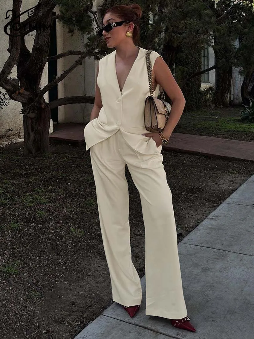 Oymimi Elegant Beige Two Piece Set For Women Fashion V-Neck Sleeveless Button Tank Top And High Wiast Simple Straight Pants Set
Oymimi Elegant Beige Two Piece Set For Women Fashion V-Neck Sleeveless Button Tank Top And High Wiast Simple Straight Pants Set