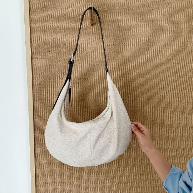Korean Style Moon Shoulder Bag New Highquality Cotton Linen PU Splicing Women Crossbody Bag Casual Commuting Dumpling Bag
Korean Style Moon Shoulder Bag New Highquality Cotton Linen PU Splicing Women Crossbody Bag Casual Commuting Dumpling Bag