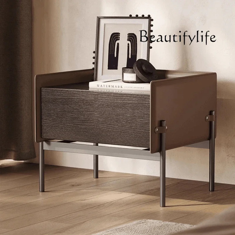 Italian saddle leather solid wood bedside table minimalist bedroom smoke locker high-end design sense
Italian saddle leather solid wood bedside table minimalist bedroom smoke locker high-end design sense