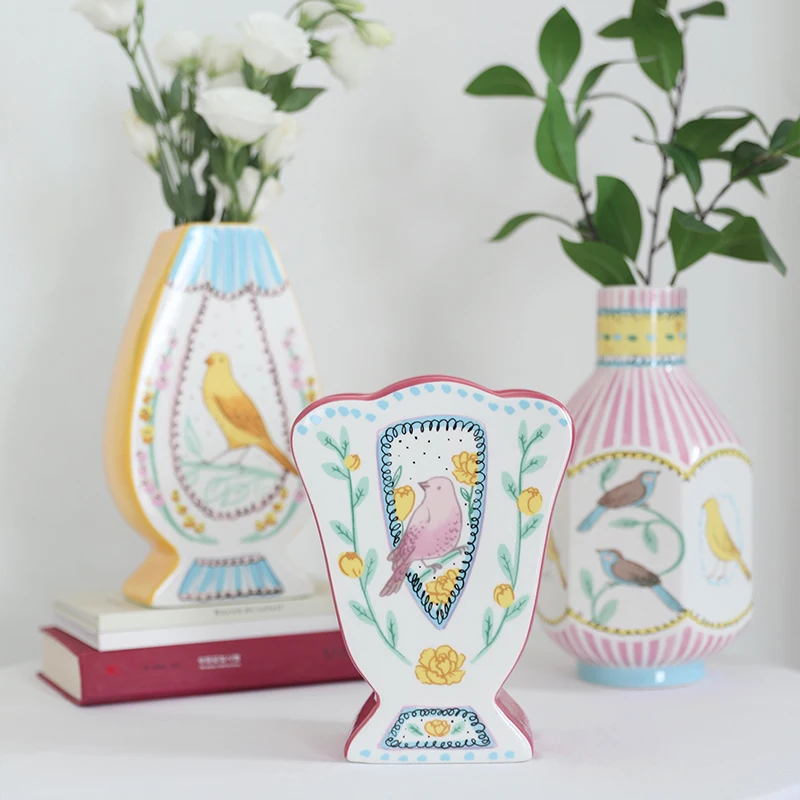 Modern simple hand-painted nightingale ceramic vase, Korean hand-painted rose vase ceramic ornaments, home desktop decorations
Modern simple hand-painted nightingale ceramic vase, Korean hand-painted rose vase ceramic ornaments, home desktop decorations