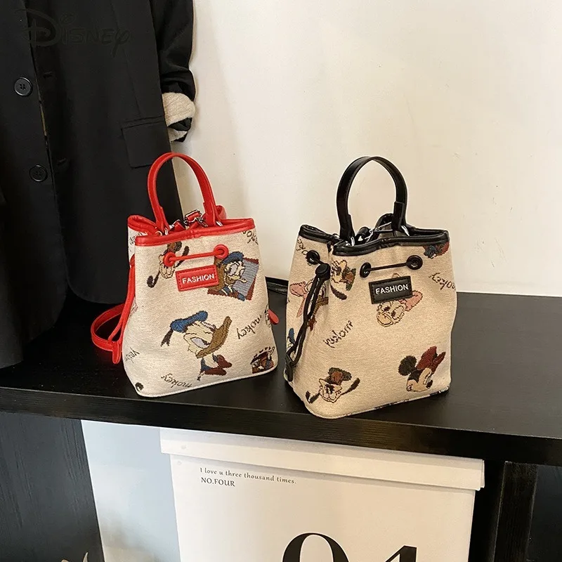 Mickey 2025 New Women's Handbag Fashion High Quality Drawstring Bucket Bag Casual Versatile Large Capacity Women's Shoulder Bag
Mickey 2025 New Women's Handbag Fashion High Quality Drawstring Bucket Bag Casual Versatile Large Capacity Women's Shoulder Bag
