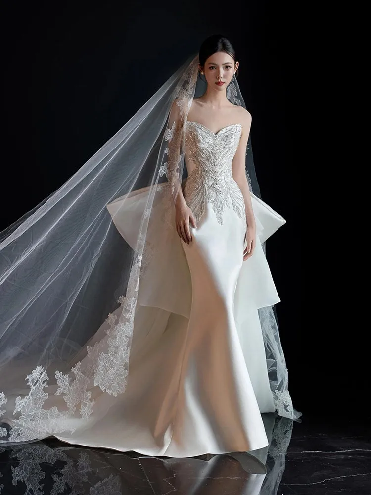 A new fish-tail light satin dress for morning gown and toasting
A new fish-tail light satin dress for morning gown and toasting
