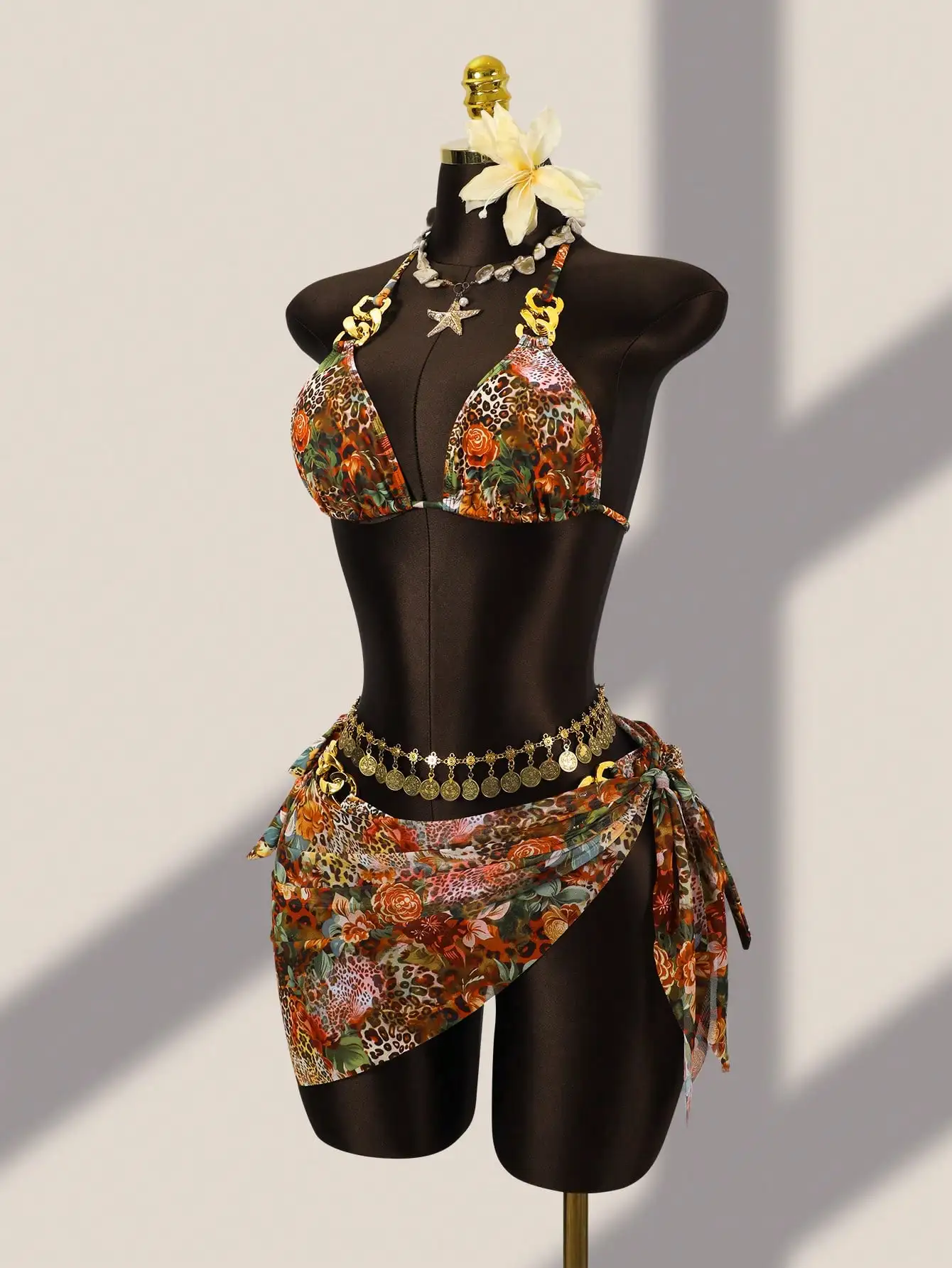 Floral Leopard Print 3-Piece Bikini Set With Chain Halter And Coin Belt
Floral Leopard Print 3-Piece Bikini Set With Chain Halter And Coin Belt