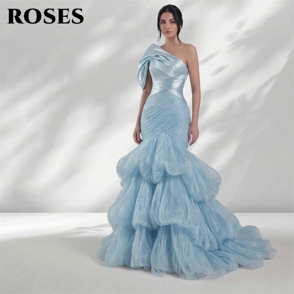 ROSES Blue Organza Party Dresses One Shoulder Short Sleeve Evening Dresses Layered Hem فساتين السهرة Wrap Hips Unique Customized
ROSES Blue Organza Party Dresses One Shoulder Short Sleeve Evening Dresses Layered Hem فساتين السهرة Wrap Hips Unique Customized