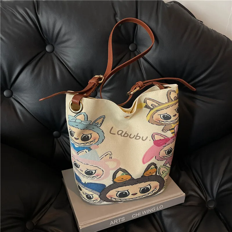 Versatile cute cartoon bucket canvas bag 2024 new texture painted casual shoulder crossbody bag
Versatile cute cartoon bucket canvas bag 2024 new texture painted casual shoulder crossbody bag