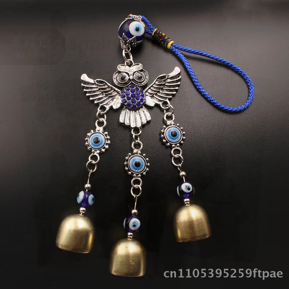 Alloy winged owl blue diamond copper bell blue eyes car pendant
Alloy winged owl blue diamond copper bell blue eyes car pendant