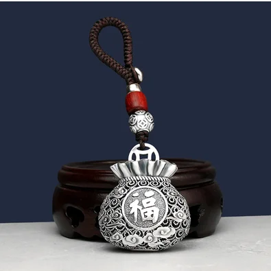 Sterling silver blessing bag key pendant couple car key chain pendant creative silver car hanging silver ornament
Sterling silver blessing bag key pendant couple car key chain pendant creative silver car hanging silver ornament