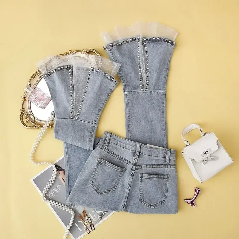 New Spring and summer light nine point micro flared pants women s splicing lace mesh rivets high waist thin split jeans
New Spring and summer light nine point micro flared pants women s splicing lace mesh rivets high waist thin split jeans