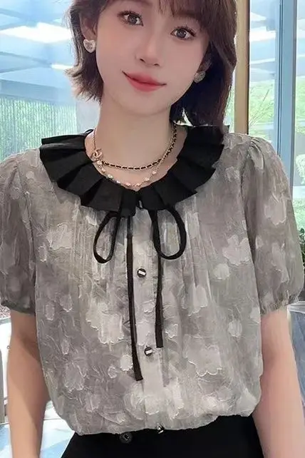 Ruffle Tied Jacquard Sweet Shirt Summer French Style Slimming Age-Reducing Fresh Top
Ruffle Tied Jacquard Sweet Shirt Summer French Style Slimming Age-Reducing Fresh Top