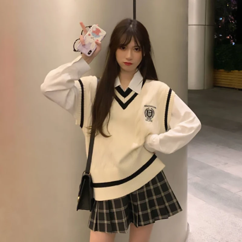 Женский вязаный жилет свободного кроя в корейском стиле, осенне-зимний, в университетском стиле, свитер-топ, верхняя одежда, комплект из двух предметов, V-образный вырез, стандартная длина
Женский вязаный жилет свободного кроя в корейском стиле, осенне-зимний, в университетском стиле, свитер-топ, верхняя одежда, комплект из двух предметов, V-образный вырез, стандартная длина