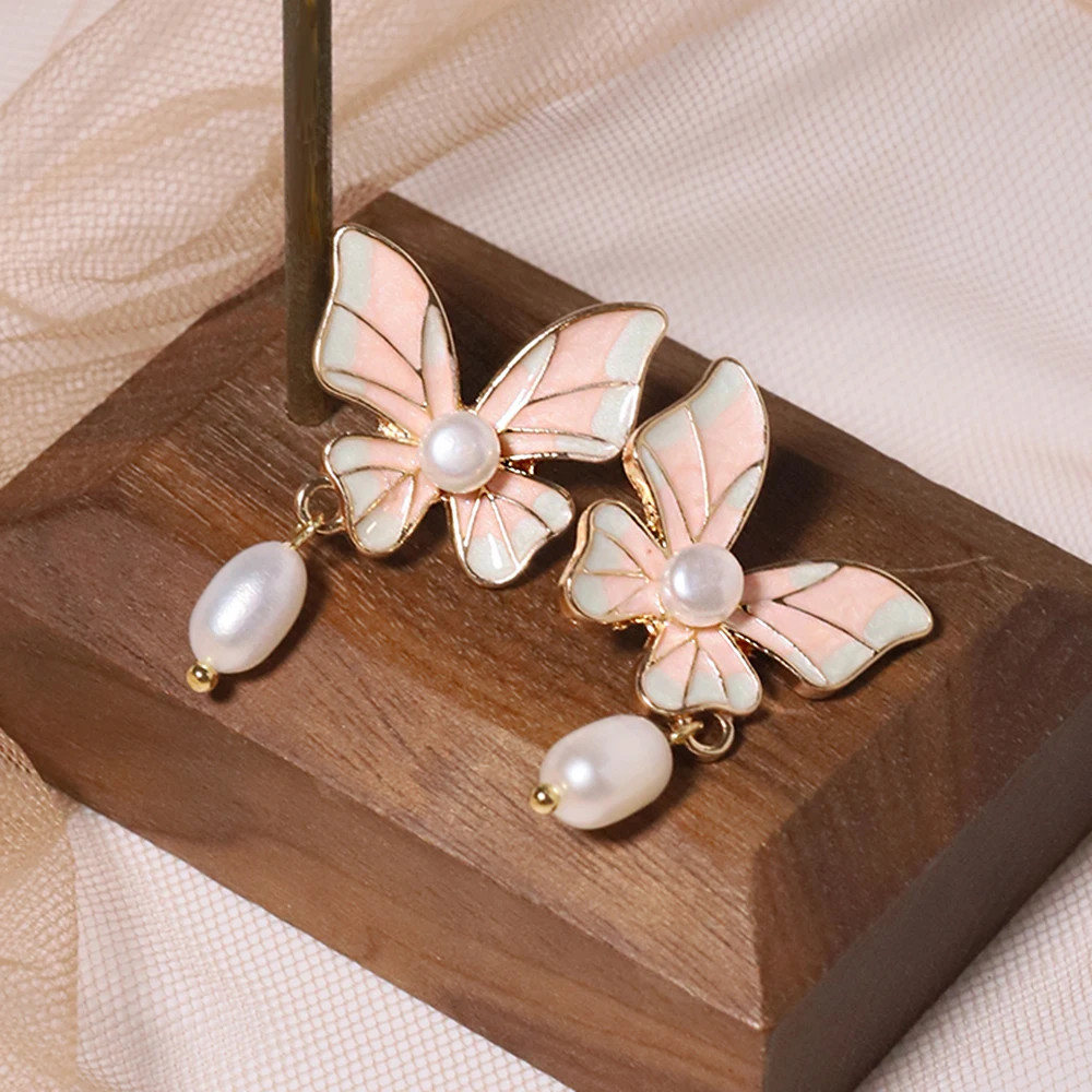 Natural Freshwater Pearl Pink Butterfly Pendant Earrings Korean Style Women Luxury Jewelry Fashion Ladies and Girls Gift GE1584
Natural Freshwater Pearl Pink Butterfly Pendant Earrings Korean Style Women Luxury Jewelry Fashion Ladies and Girls Gift GE1584