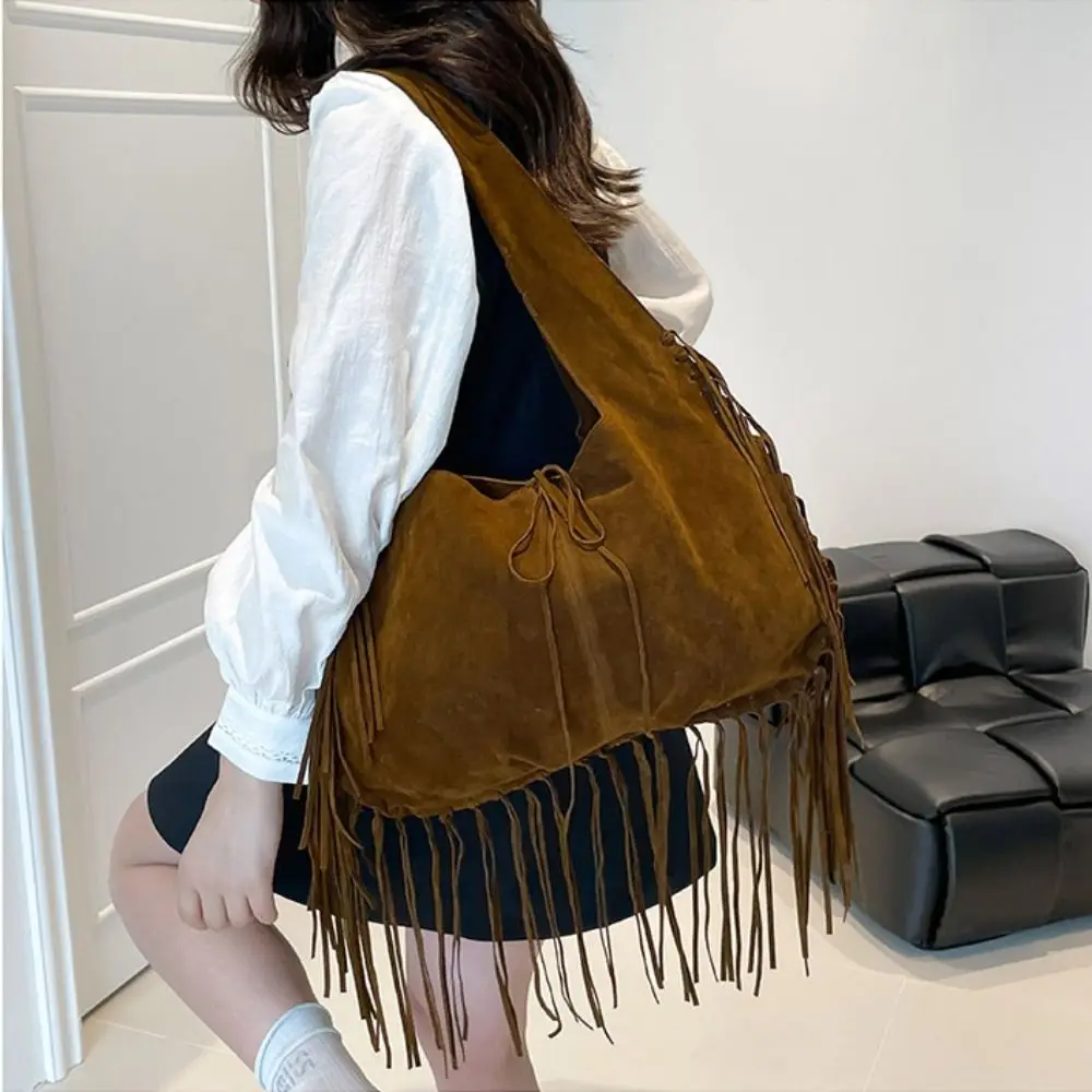 Cute Korean Style Tassel Shoulder Bag Solid Color Tote Bag Suede Handbag Ethnic Style Large Capacity Underarm Packs Girls
Cute Korean Style Tassel Shoulder Bag Solid Color Tote Bag Suede Handbag Ethnic Style Large Capacity Underarm Packs Girls