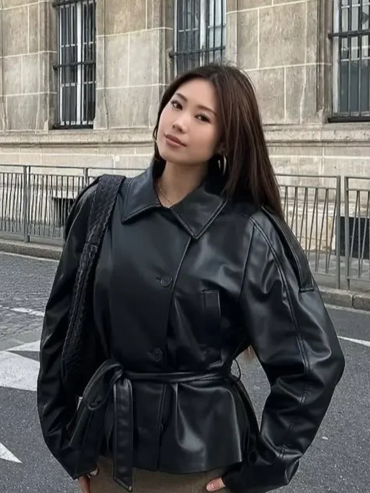 Solid Black Glossy Lace Up Leather Jackets Lady Vintage Lapel Single Breasted Pocket Loose Coat 2026 New Daily Street Outerwear
Solid Black Glossy Lace Up Leather Jackets Lady Vintage Lapel Single Breasted Pocket Loose Coat 2026 New Daily Street Outerwear