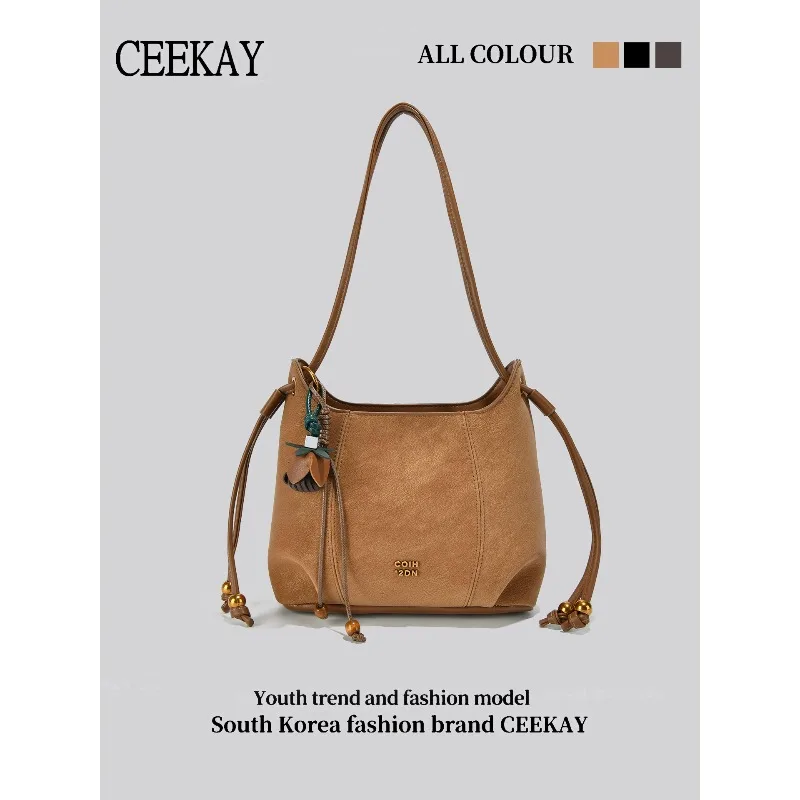 Сумка-ведро CEEKAY 2026: Новая винтажная модель из мягкой кожи с подвеской-тюльпаном и декором из бусин на шнурке, повседневная женская сумка через плечо
Сумка-ведро CEEKAY 2026: Новая винтажная модель из мягкой кожи с подвеской-тюльпаном и декором из бусин на шнурке, повседневная женская сумка через плечо