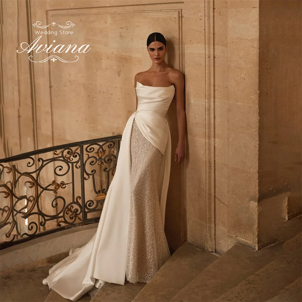 Aviana индивидуальное свадебное платье без бретелек с вырезом «лодочка» без рукавов со шлейфом длиной до пола, элегантный дизайн высокого качества
Aviana индивидуальное свадебное платье без бретелек с вырезом «лодочка» без рукавов со шлейфом длиной до пола, элегантный дизайн высокого качества