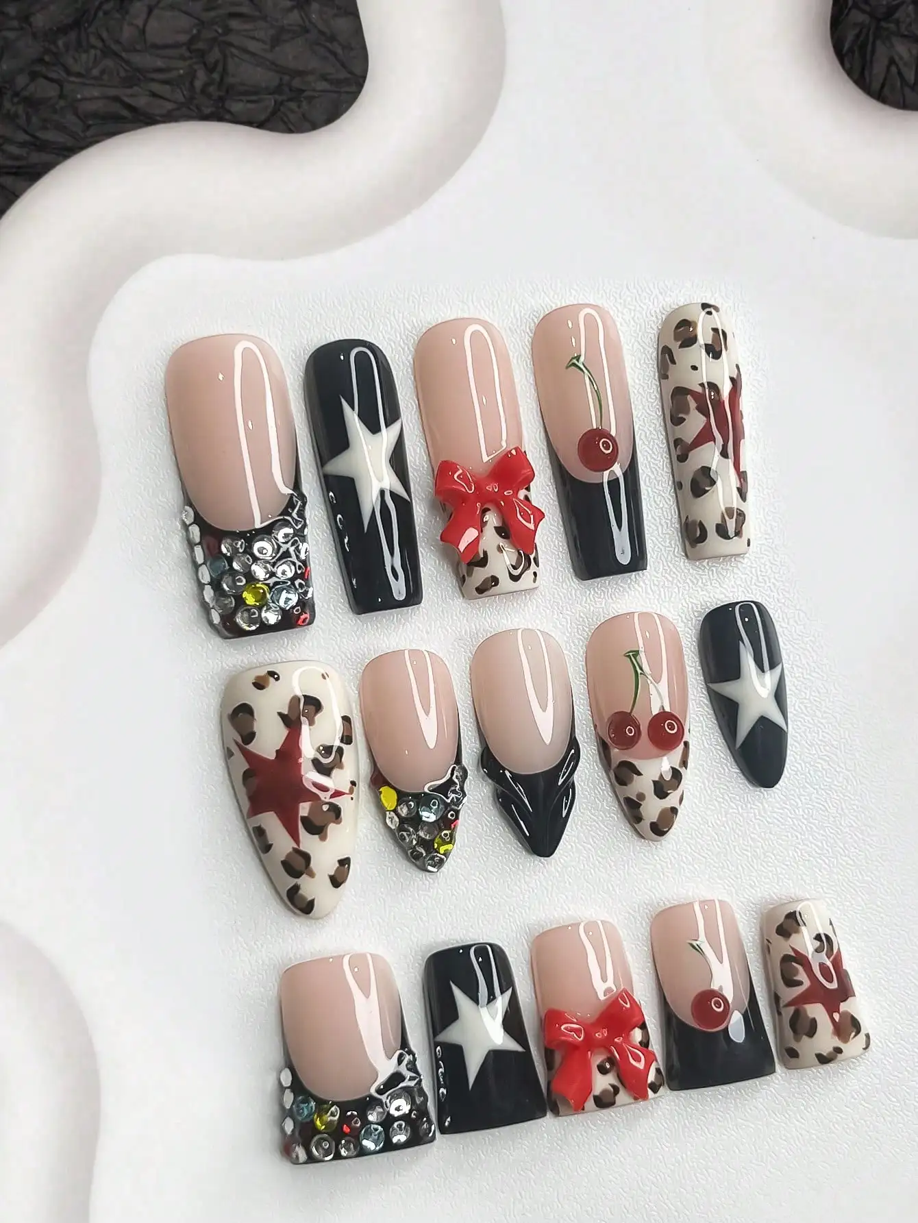 10pcs Y2K Style Handmade Nail Art Set, Including Gel Nail Kit, Hand-Painted White Stripes, Black Dots, Black Pentagram Nail Decorations, Shiny Silver Flat Rhinestones Nail Accessories, With Nail Tools (1 Jelly Sticker + 1 Nail File). Available In 3 Sizes:
10pcs Y2K Style Handmade Nail Art Set, Including Gel Nail Kit, Hand-Painted White Stripes, Black Dots, Black Pentagram Nail Decorations, Shiny Silver Flat Rhinestones Nail Accessories, With Nail Tools (1 Jelly Sticker + 1 Nail File). Available In 3 Sizes: