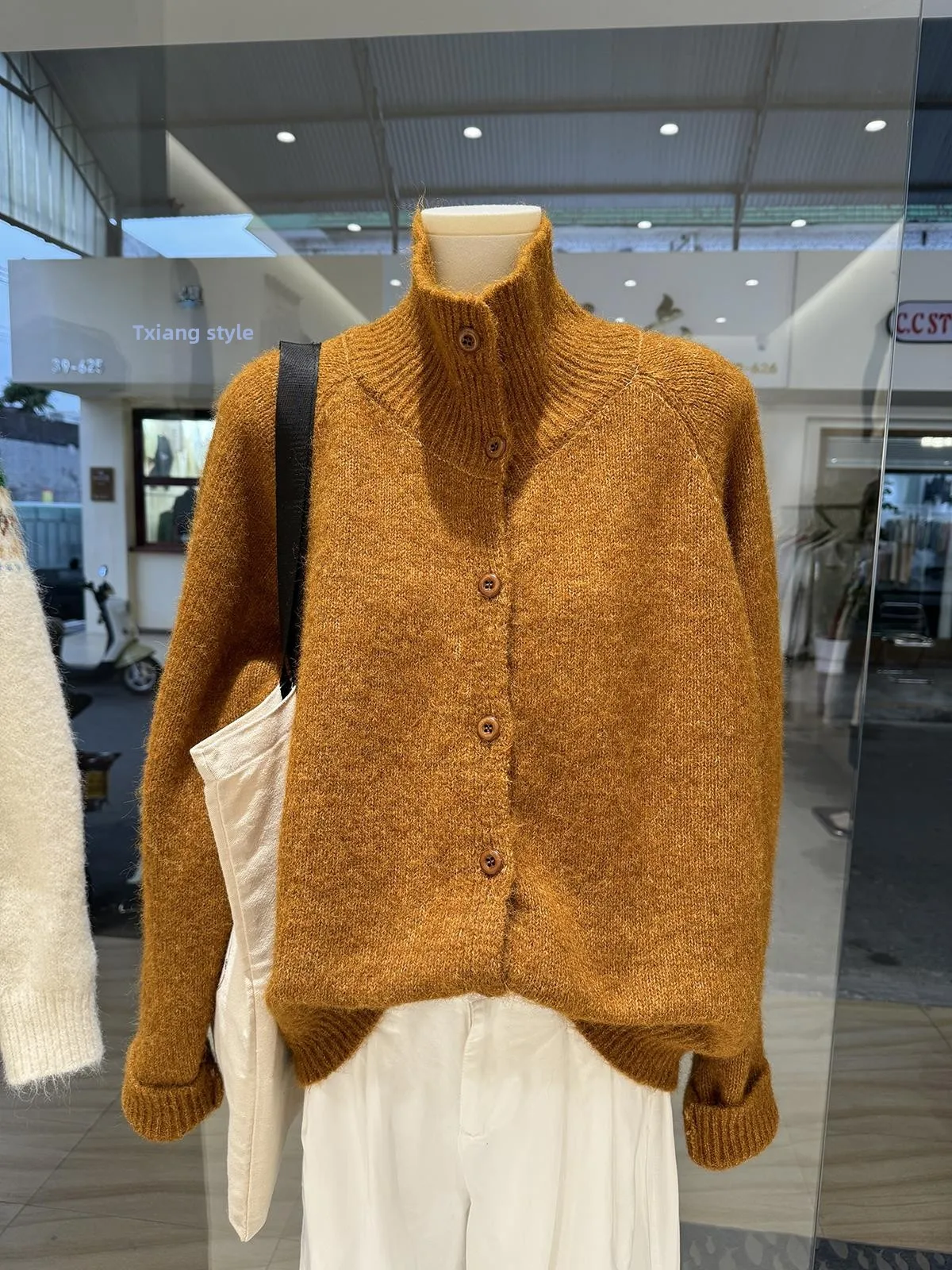 Women's Stand Collar Knitted Sweater Coat Loose Fit Soft Cozy Button up Cardigan Top Trendy Autumn Winter High End Feeling
Women's Stand Collar Knitted Sweater Coat Loose Fit Soft Cozy Button up Cardigan Top Trendy Autumn Winter High End Feeling