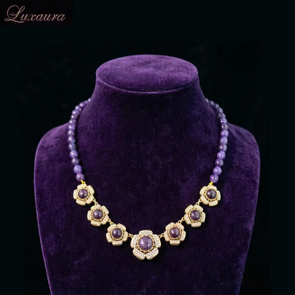 Vintage jewelry featuring a fashionable and classic purple geometric necklace design paired with Bohemian style women's necklace
Vintage jewelry featuring a fashionable and classic purple geometric necklace design paired with Bohemian style women's necklace