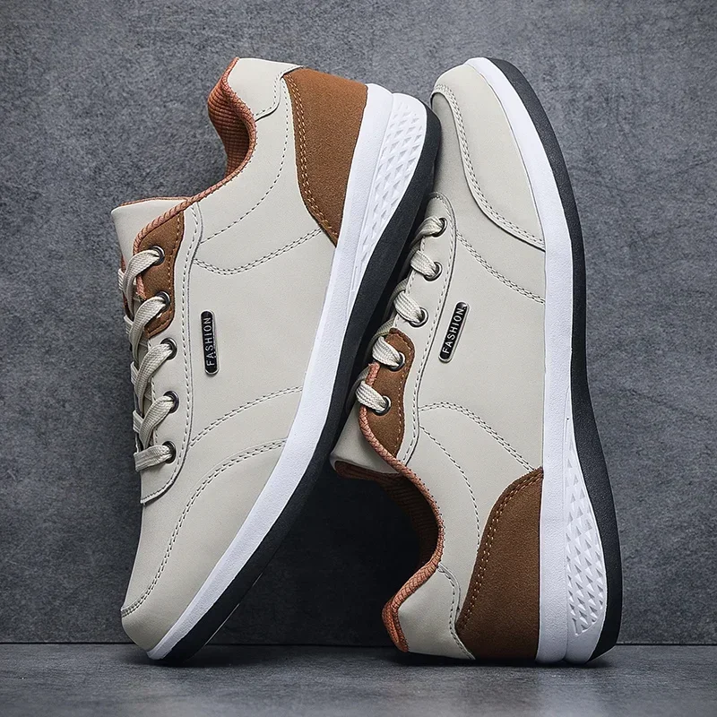 New Spring Autumn Walking Men's Sneakers Leisure Male Leather Sports Shoes Non-Slip Footwear Tennis for Men
New Spring Autumn Walking Men's Sneakers Leisure Male Leather Sports Shoes Non-Slip Footwear Tennis for Men