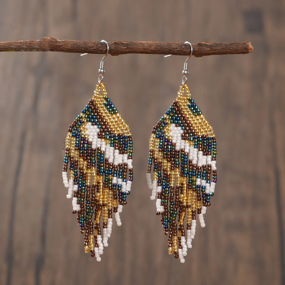 Beaded earrings Tassel Retro Trend Originality Bohemia Design Irregularity Hand knitting Alloy Female Simple Rice bead earrings
Beaded earrings Tassel Retro Trend Originality Bohemia Design Irregularity Hand knitting Alloy Female Simple Rice bead earrings