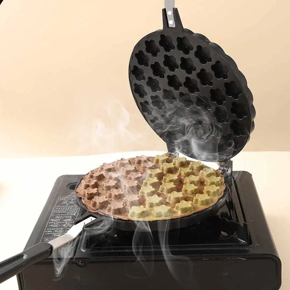 19/37 Holes Plum Blossom Cake Mold Double-Sided Long Handle Bubble Waffle Maker Durable Heat-resistant Ice Cream Cone Maker
19/37 Holes Plum Blossom Cake Mold Double-Sided Long Handle Bubble Waffle Maker Durable Heat-resistant Ice Cream Cone Maker