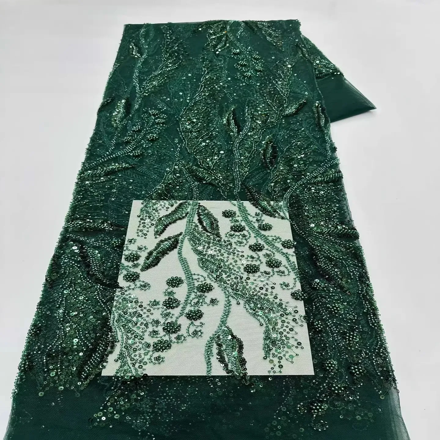 Новая марлевая ткань 5 ярдов для одежды, изысканная вышивка пайетками в виде цветов, материал для пошива свадебных платьев и ципао.
Новая марлевая ткань 5 ярдов для одежды, изысканная вышивка пайетками в виде цветов, материал для пошива свадебных платьев и ципао.