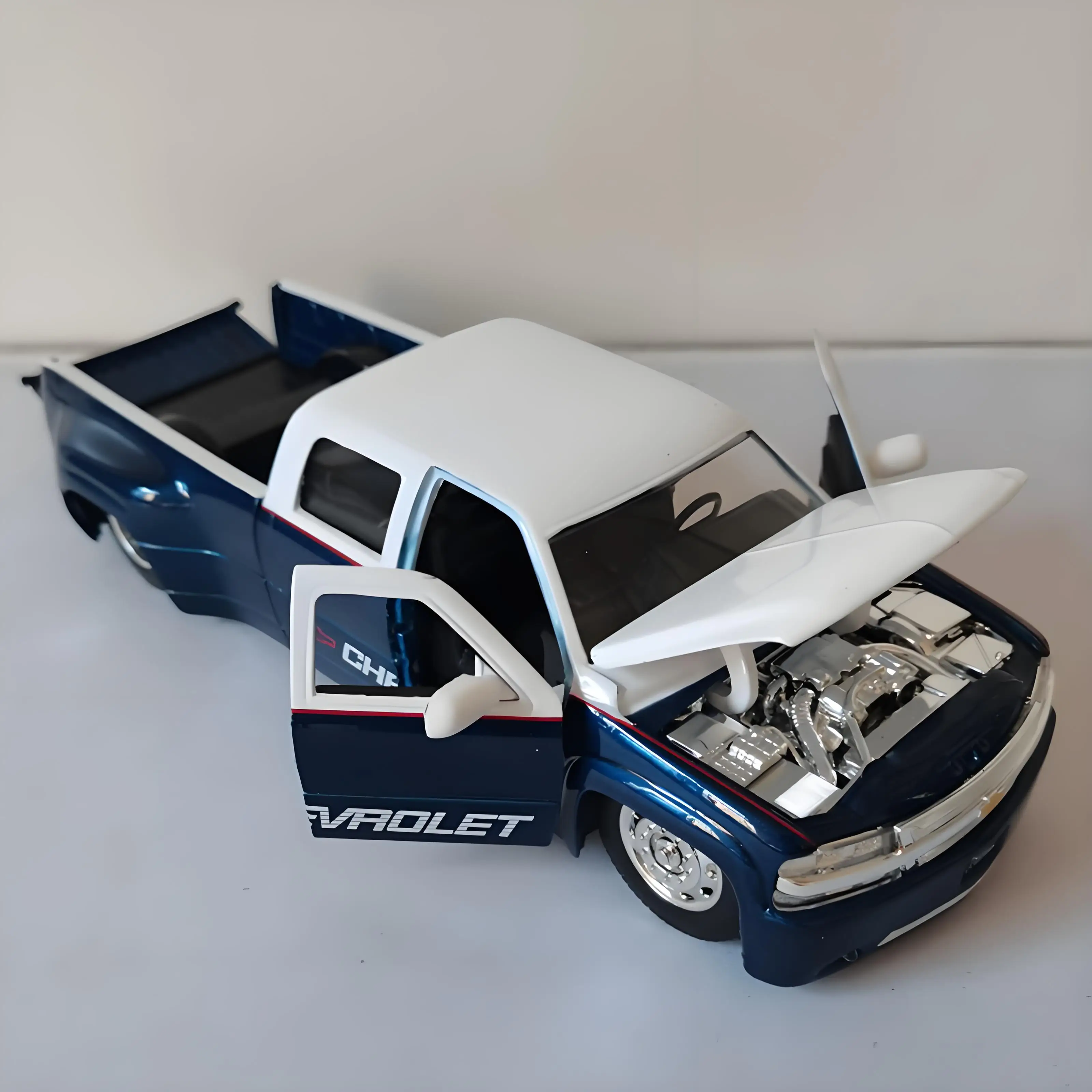JADA 1:24 Silverado Dually 1999, легкосплавный автомобиль, литье под давлением и игрушечный транспорт, модель автомобиля, миниатюрная масштабная модель автомобиля для детей
JADA 1:24 Silverado Dually 1999, легкосплавный автомобиль, литье под давлением и игрушечный транспорт, модель автомобиля, миниатюрная масштабная модель автомобиля для детей