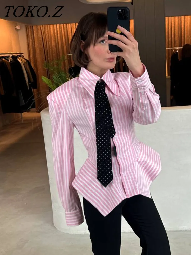 TOKO Women's Spring Summer Lapel Striped Fitted Asymmetric Hem Shirt Casual Streetwear 2026 Trendy Feminine Fashion Outfit Shirt
TOKO Women's Spring Summer Lapel Striped Fitted Asymmetric Hem Shirt Casual Streetwear 2026 Trendy Feminine Fashion Outfit Shirt