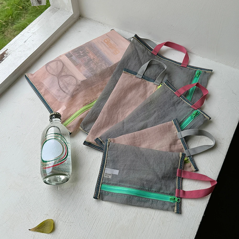 Translucent Mesh Nylon Storage Bag Portable Zipper Handbag Travel Functional Cosmetic Pouch Pencil Case Document Paper Organizer
Translucent Mesh Nylon Storage Bag Portable Zipper Handbag Travel Functional Cosmetic Pouch Pencil Case Document Paper Organizer