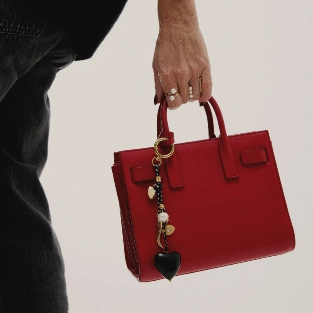 Модная жемчужная сумка цвета макарон, подвеска в форме сердца, сумка из цинкового сплава, подвеска, автомобильный брелок «сделай сам»
Модная жемчужная сумка цвета макарон, подвеска в форме сердца, сумка из цинкового сплава, подвеска, автомобильный брелок «сделай сам»