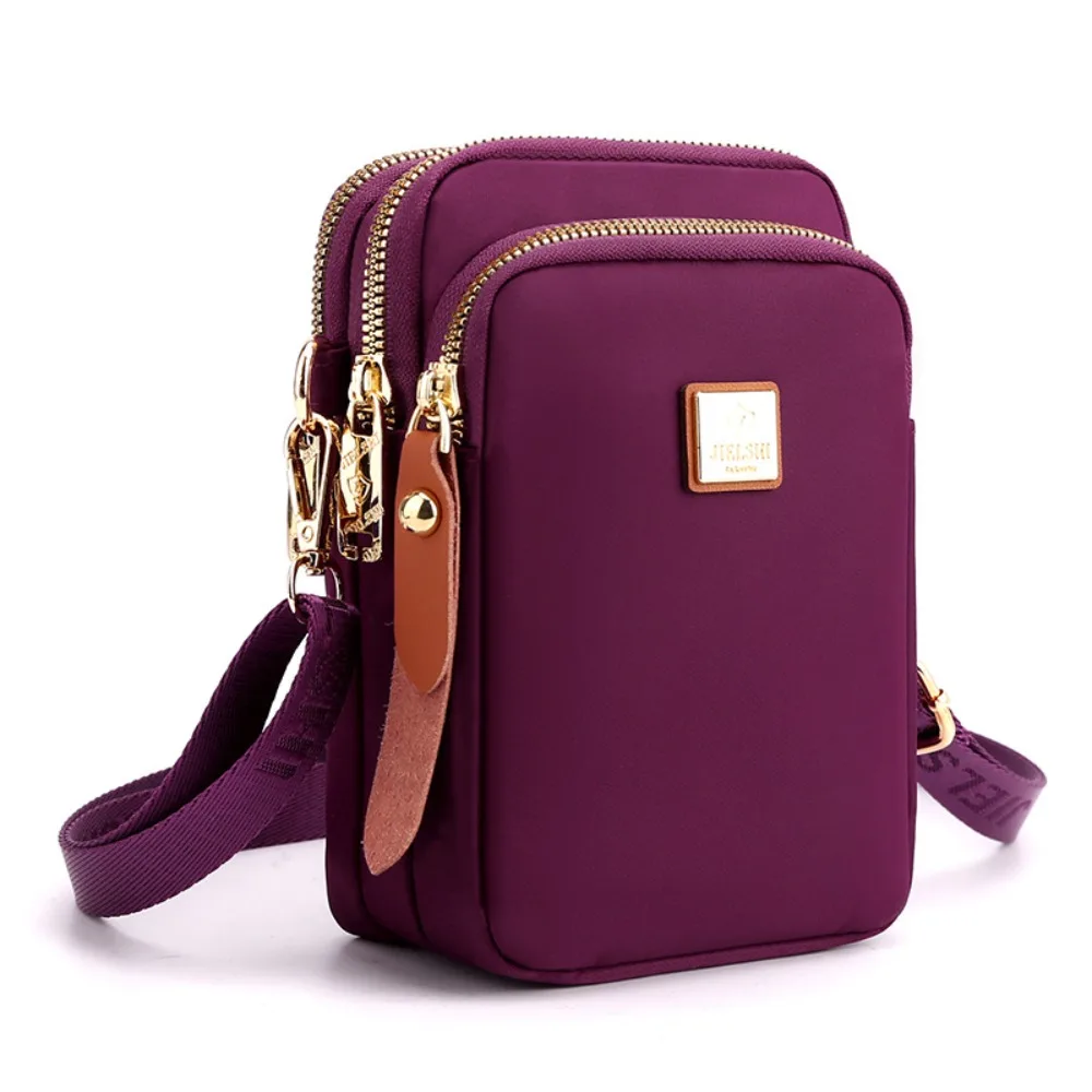 Zipper Nylon Mobile Phone Bag Large Capacity Casual Single Shoulder Bag Adjustable Strap Multiple Usages Ladies Messenger Bag
Zipper Nylon Mobile Phone Bag Large Capacity Casual Single Shoulder Bag Adjustable Strap Multiple Usages Ladies Messenger Bag