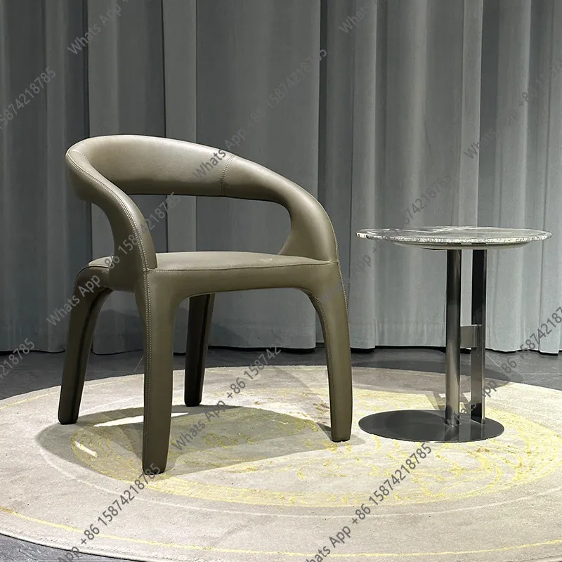 Italian dining chair simple modern light luxury armrest back chair household high-end creative leather art book desk and chair
Italian dining chair simple modern light luxury armrest back chair household high-end creative leather art book desk and chair