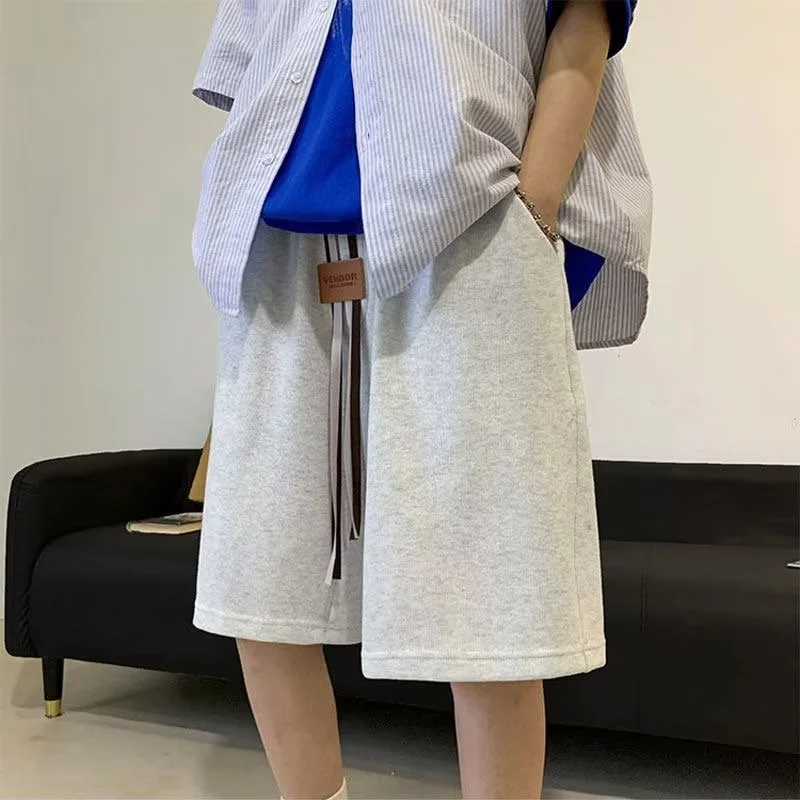 Летние шорты Y2K для мужчин, повседневные спортивные штаны для баскетбола, мешковатые короткие спортивные штаны с аппликацией на шнурке, однотонные бермуды, мужские
Летние шорты Y2K для мужчин, повседневные спортивные штаны для баскетбола, мешковатые короткие спортивные штаны с аппликацией на шнурке, однотонные бермуды, мужские