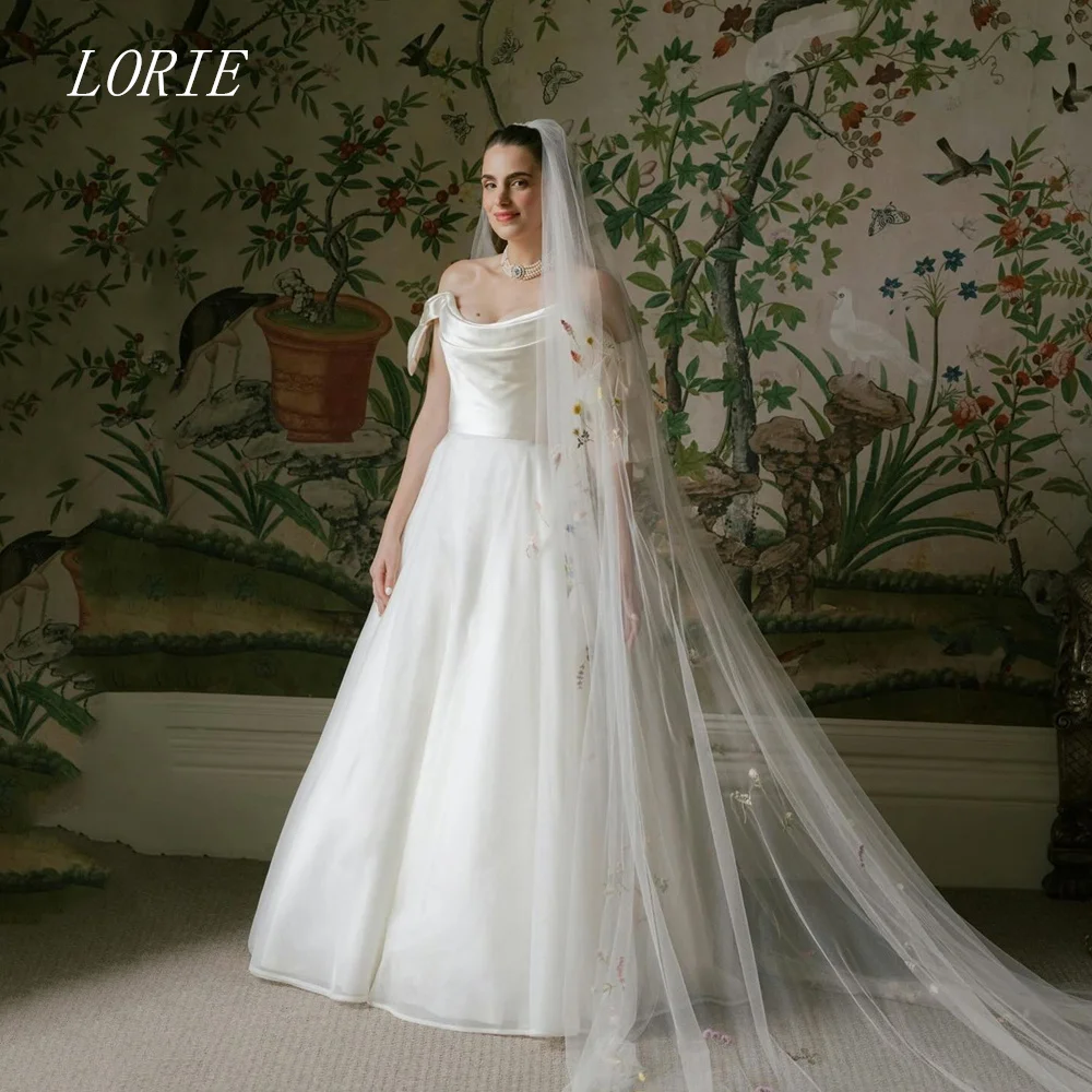 LORIE Luxury Illusion A Line Wedding Dress Cascade Off The Shoulder Bridal Dresses Boat Neck Wedding Gown Customized 2026
LORIE Luxury Illusion A Line Wedding Dress Cascade Off The Shoulder Bridal Dresses Boat Neck Wedding Gown Customized 2026