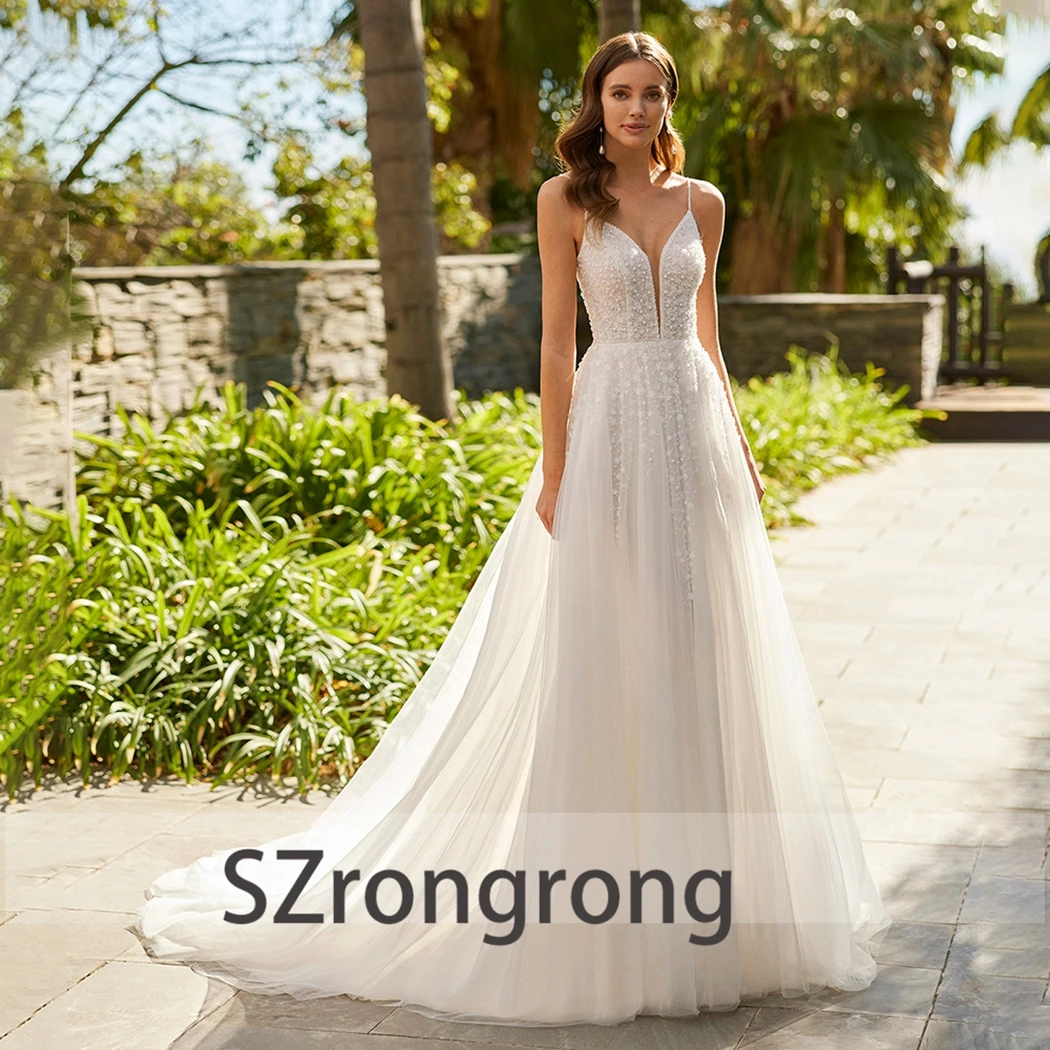 Customized Spaghetti Straps Tulle A-line Wedding Party Dress Spotted Open Back Floor Length Bridal Gown with Sweep Train
Customized Spaghetti Straps Tulle A-line Wedding Party Dress Spotted Open Back Floor Length Bridal Gown with Sweep Train