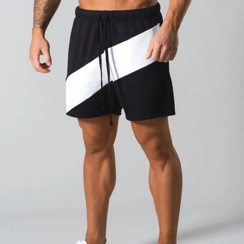 Summer new fashion loose cotton men's shorts Trend color matching casual quarter pants Joggers running exercise fitness pants
Summer new fashion loose cotton men's shorts Trend color matching casual quarter pants Joggers running exercise fitness pants