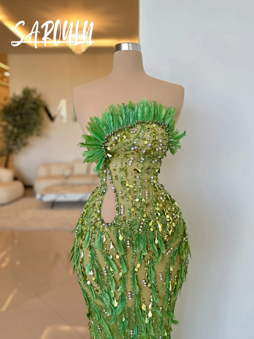 Green Illusion Beaded Prom Gown Richly Feathered Straight Rhinestones Glamorous Cut Out Strapless Customized Evening Dress
Green Illusion Beaded Prom Gown Richly Feathered Straight Rhinestones Glamorous Cut Out Strapless Customized Evening Dress