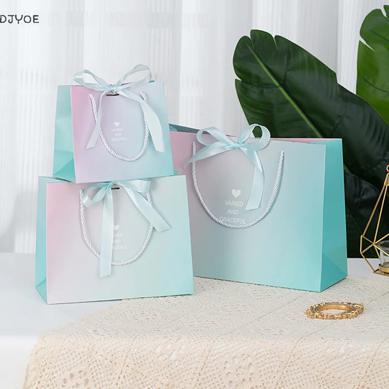3Pcs Paper Gifts Bags With Bow Recyclable Birthday Wedding Handle Shopping Bags Present Clothing Cosmetic Jewelry Packaging Bags
3Pcs Paper Gifts Bags With Bow Recyclable Birthday Wedding Handle Shopping Bags Present Clothing Cosmetic Jewelry Packaging Bags
