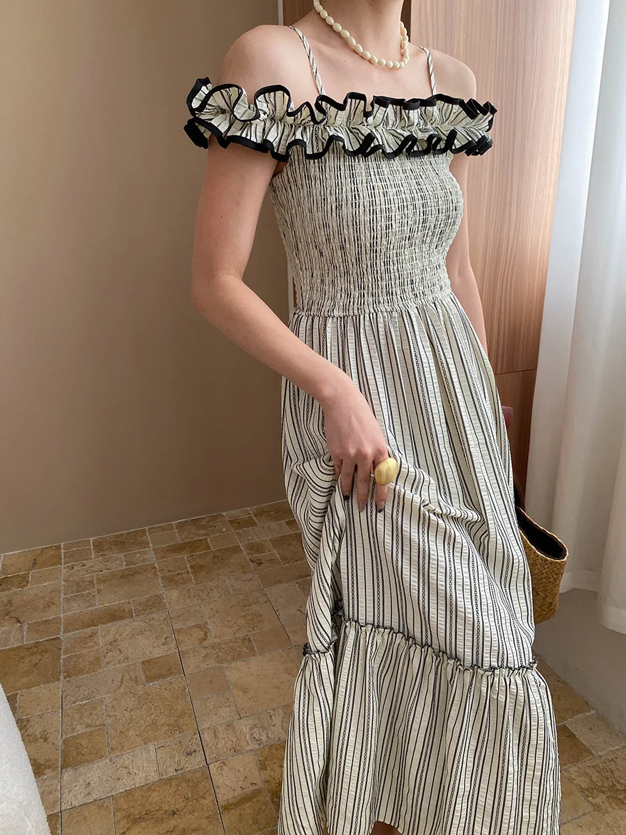 French Vacation Style Design With Wooden Ears And a One Shoulder Striped Suspender Dress
French Vacation Style Design With Wooden Ears And a One Shoulder Striped Suspender Dress