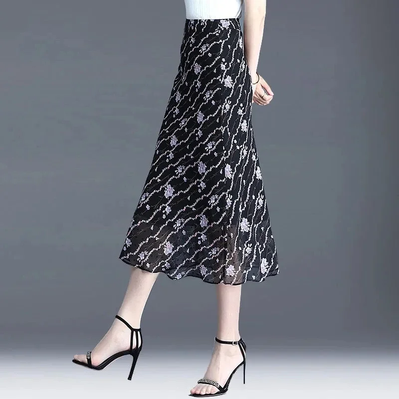 Весна-лето, новая шифоновая юбка миди, женские юбки трапециевидной формы с высокой талией, модные тонкие длинные юбки с цветочным узором 4xl
Весна-лето, новая шифоновая юбка миди, женские юбки трапециевидной формы с высокой талией, модные тонкие длинные юбки с цветочным узором 4xl
