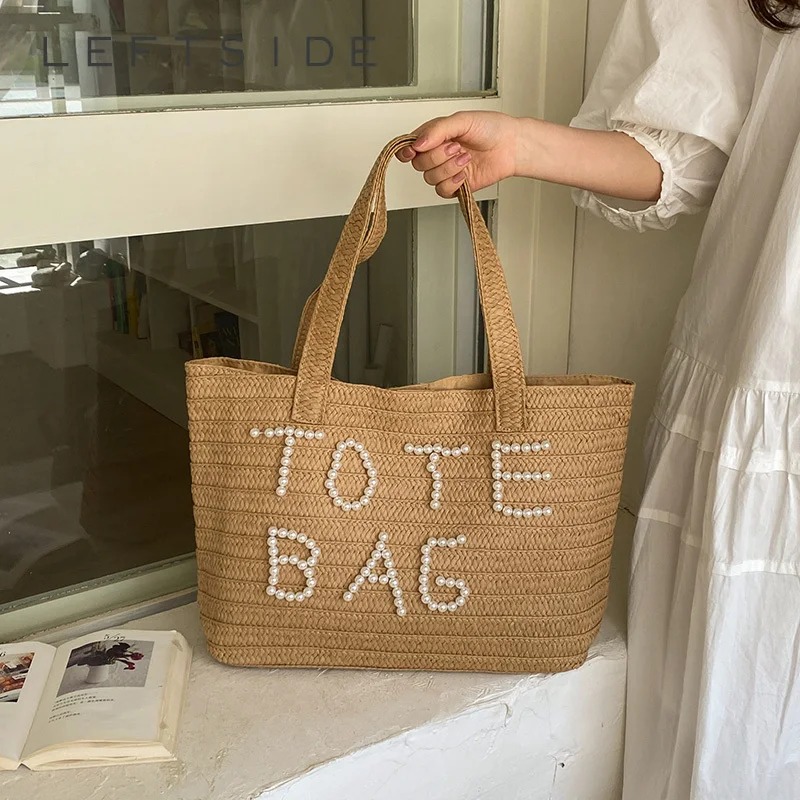 Women's Large Capacity Woven Letter Tote Bag Casual Fashion New Daily Travel Shoulder Bag 2026 Summer New Pearl Design Handbags
Women's Large Capacity Woven Letter Tote Bag Casual Fashion New Daily Travel Shoulder Bag 2026 Summer New Pearl Design Handbags