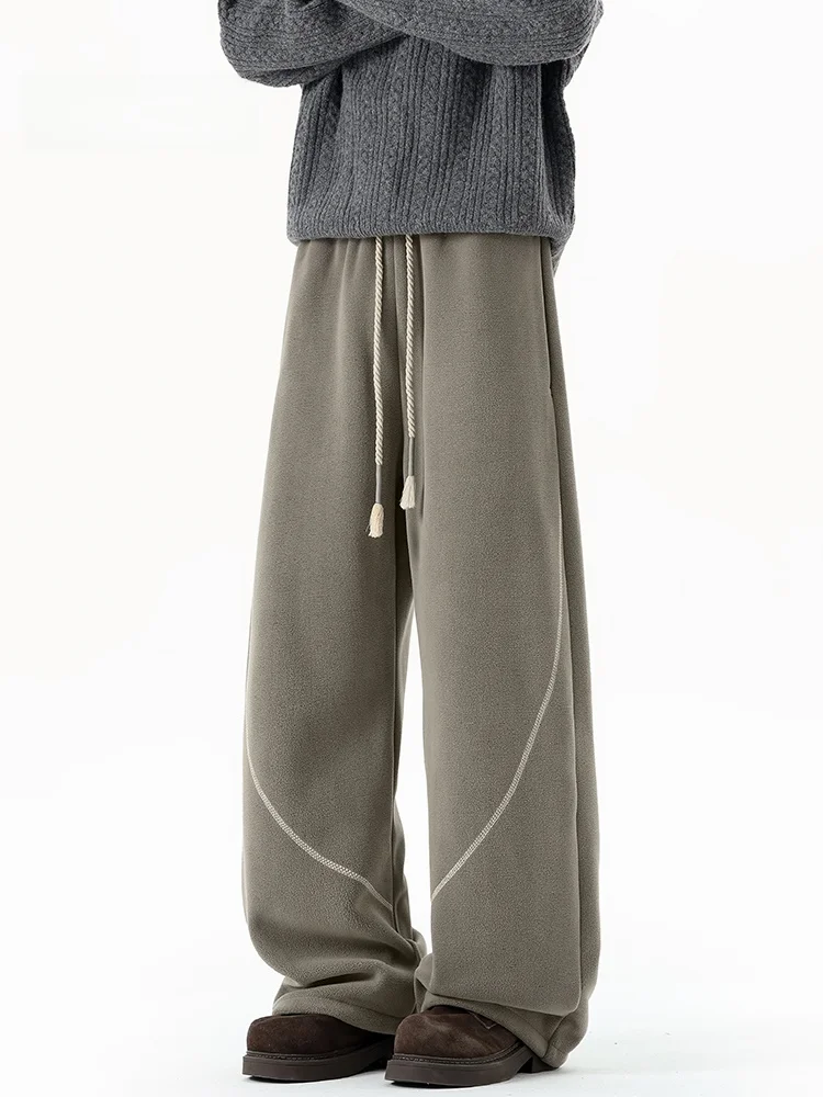 Мужские повседневные утепленные двусторонние флисовые зимние брюки свободного кроя с широкими штанинами, из смеси полиэстера и спандекса
Мужские повседневные утепленные двусторонние флисовые зимние брюки свободного кроя с широкими штанинами, из смеси полиэстера и спандекса