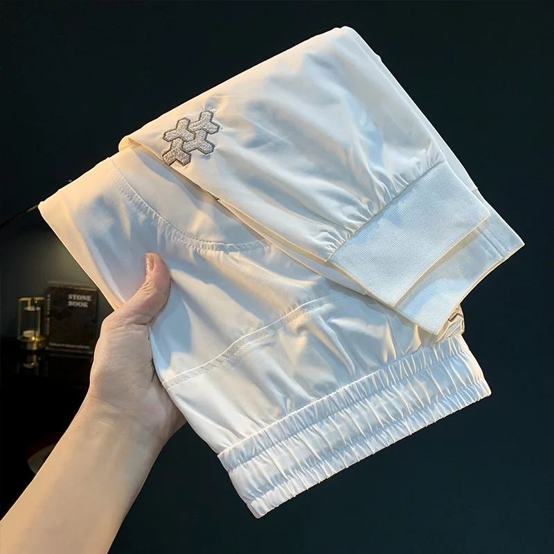 2025 Summer Thin Men's Casual Pants Sports Fashion Embroidered Foot binding Ice Silk Quick drying Pants
2025 Summer Thin Men's Casual Pants Sports Fashion Embroidered Foot binding Ice Silk Quick drying Pants