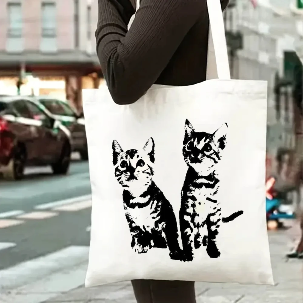 Cute Kitten Graphic Canvas Tote Bag Casual White Shoulder Bag with Black and White Cat Print for Daily Use Minimalist Versatile
Cute Kitten Graphic Canvas Tote Bag Casual White Shoulder Bag with Black and White Cat Print for Daily Use Minimalist Versatile
