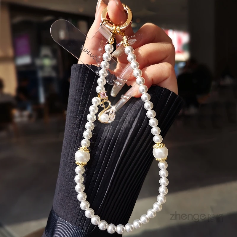 Women's Elegant Pearl Phone Lanyard,Ins Niche High-End Design,Multi-Purpose Anti-Loss Strap for Outdoor Travel
Women's Elegant Pearl Phone Lanyard,Ins Niche High-End Design,Multi-Purpose Anti-Loss Strap for Outdoor Travel